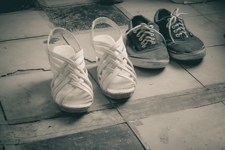 old shoe on grunge floorの写真素材