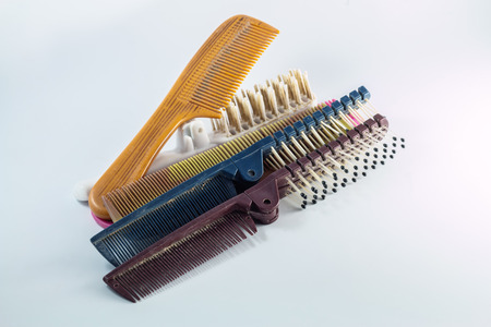 old comb on paper backgroundの写真素材