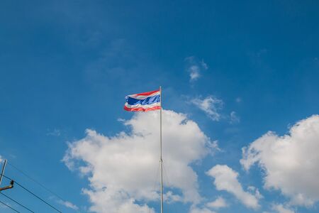Thailand flag with blue sky background