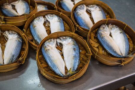 mackerel in basketの写真素材