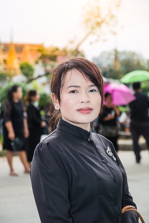 THAILAND,BANGKOK  - OCTOBER 4: One lady with black cloth during the time to Prostrate royal remains of King Bhumipol on October 4,2017 in Bangkok,THAILAND.のeditorial素材