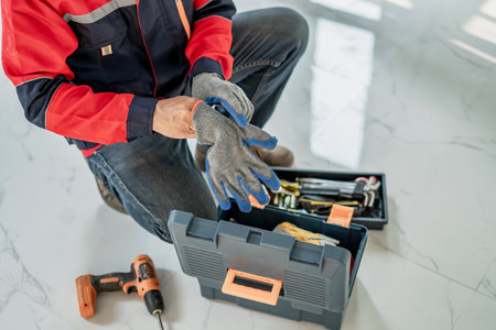 Civil engineer working with digital laser level tool in home interior design