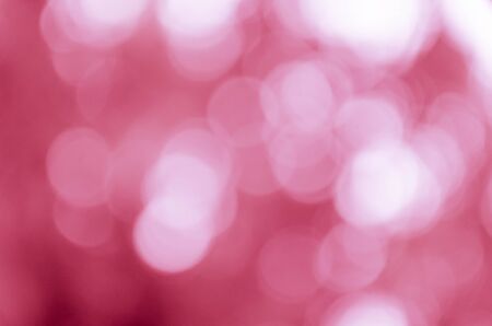 Soft blurred bokeh on pink backgroundの写真素材