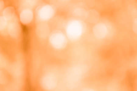 Abstract orange bokeh backgroundの写真素材