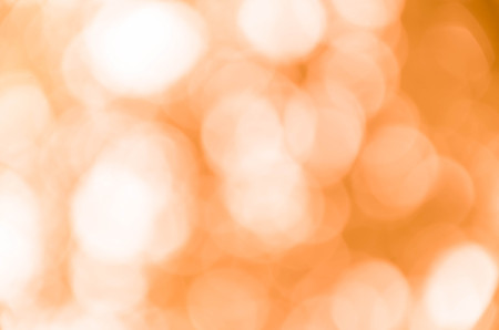 Orange bokeh abstract light backgroundの写真素材