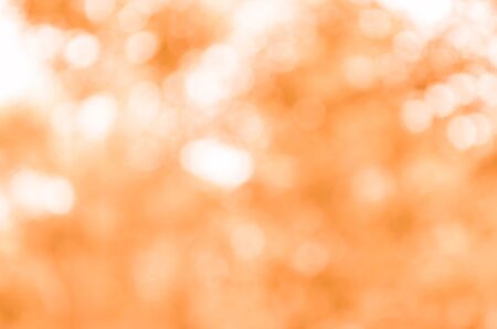 Abstract orange bokeh backgroundの写真素材
