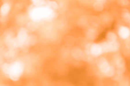 Abstract orange bokeh backgroundの写真素材