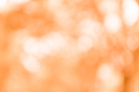 Abstract orange bokeh backgroundの写真素材