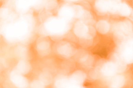 Abstract orange bokeh backgroundの写真素材