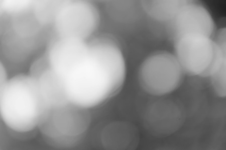 Bokeh on gray blurred backgroundの写真素材