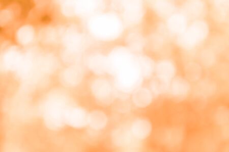 Abstract orange bokeh backgroundの写真素材