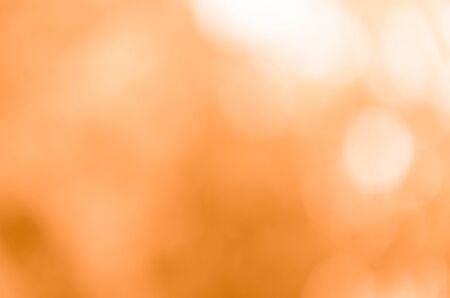 Orange bokeh abstract light backgroundの写真素材