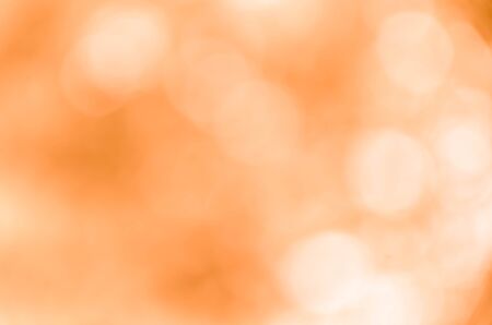 Orange bokeh abstract light backgroundの写真素材