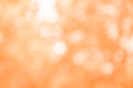 Abstract orange bokeh backgroundの写真素材