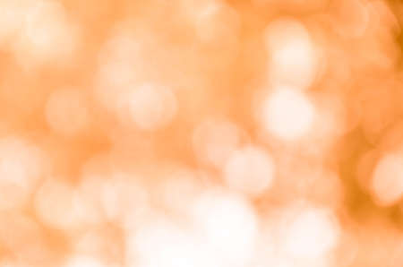 Abstract orange bokeh backgroundの写真素材