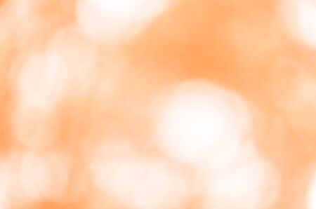 Orange bokeh abstract light backgroundの写真素材