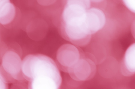 Soft blurred bokeh on pink backgroundの写真素材