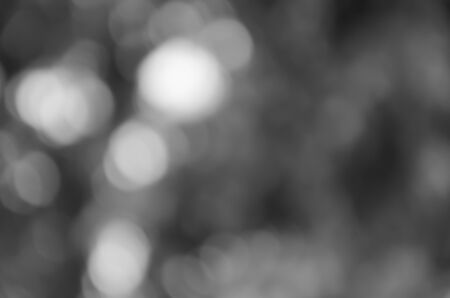 Bokeh on gray blurred backgroundの写真素材