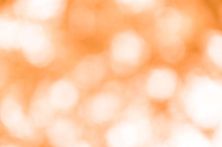 Abstract orange bokeh backgroundの写真素材
