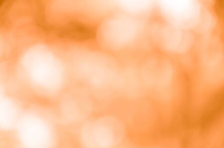 Abstract orange bokeh backgroundの写真素材