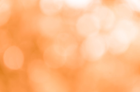 Orange bokeh abstract light backgroundの写真素材