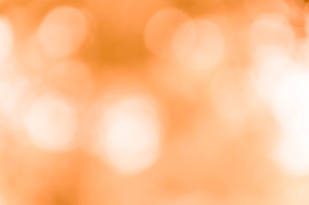 Orange bokeh abstract light backgroundの写真素材