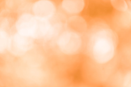Orange bokeh abstract light backgroundの写真素材