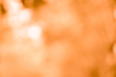 Orange bokeh abstract light backgroundの写真素材