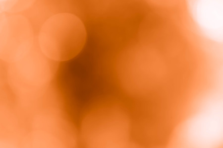 orange bokeh background from nature under tree shade