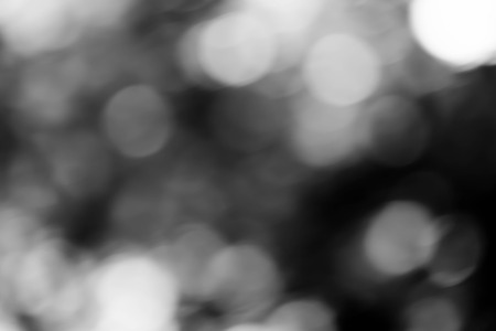 blurred bokeh lights on black loop backgroundの写真素材