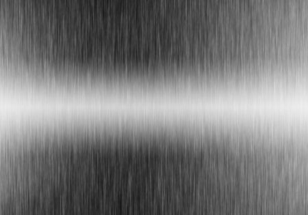 Metal background or texture of brushed steel plate with reflectionの写真素材