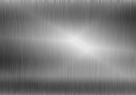 Metal background or texture of brushed steel plate with reflectionの写真素材