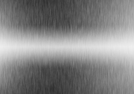 Metal background or texture of brushed steel plate with reflectionの写真素材