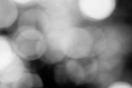 Black bokeh backgroundの写真素材