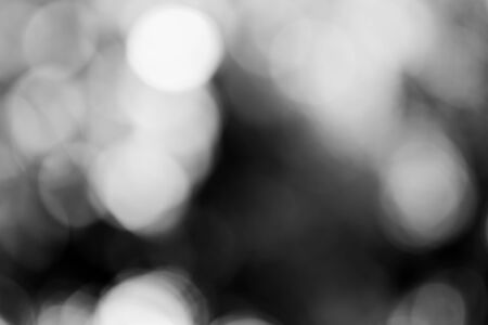 Abstract black bokeh backgroundの写真素材