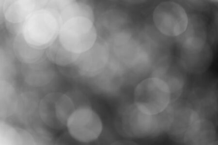 Black bokeh backgroundの写真素材
