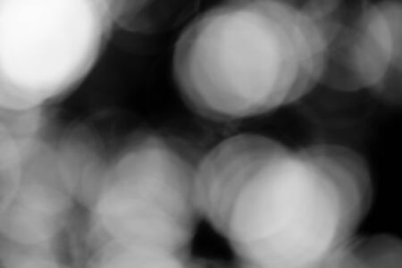 Abstract black bokeh backgroundの写真素材