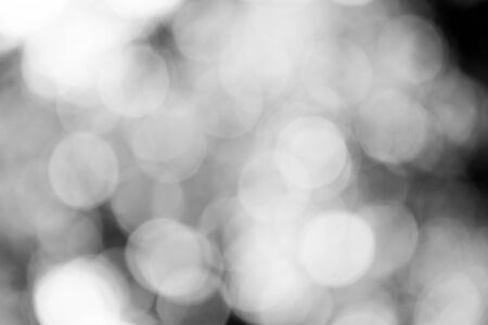 Black bokeh backgroundの写真素材