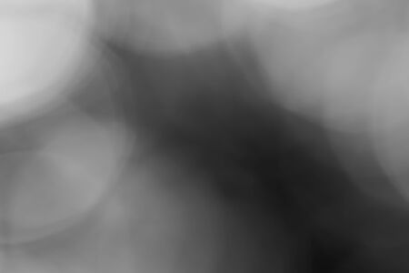 blurred bokeh lights on black loop backgroundの写真素材