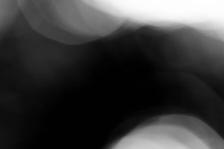 Abstract black bokeh backgroundの写真素材