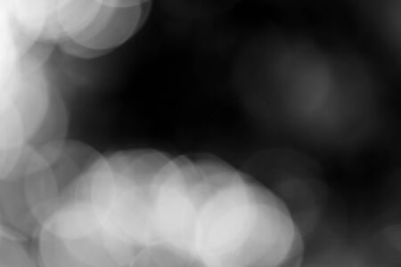 Abstract black bokeh backgroundの写真素材