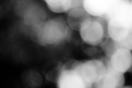 Abstract black bokeh backgroundの写真素材