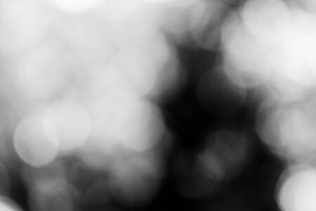 Abstract black bokeh backgroundの写真素材