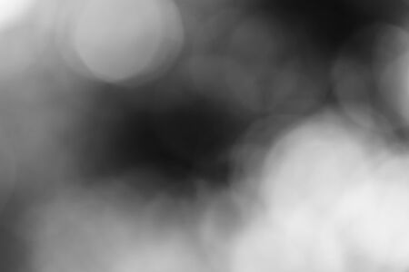 Abstract black bokeh backgroundの写真素材