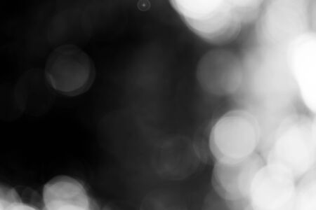 Black bokeh backgroundの写真素材