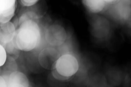 Black bokeh backgroundの写真素材