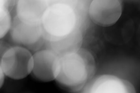 Black bokeh backgroundの写真素材