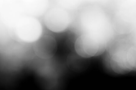 Black bokeh backgroundの写真素材