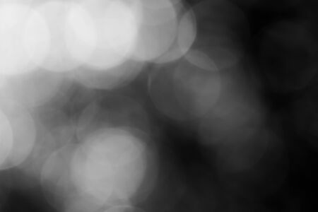 Black bokeh backgroundの写真素材