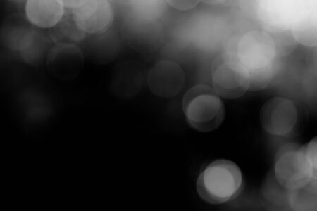 Black bokeh backgroundの写真素材